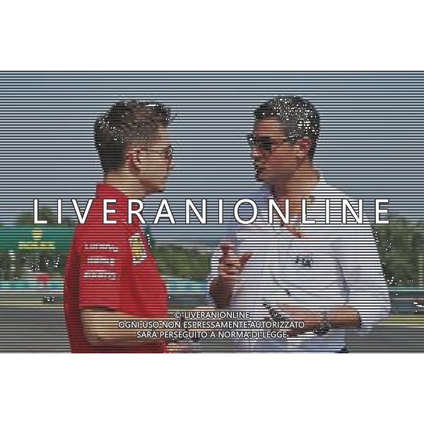(L to R): Charles Leclerc (MON) Ferrari with Michael Masi (AUS) FIA Race Director. 01.08.2019. Formula 1 World Championship, Rd 12, Hungarian Grand Prix, Budapest, Hungary, Preparation Day. AG ALDO LIVERANI SAS-ONLY ITALY
