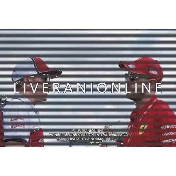 (L to R): Kimi Raikkonen (FIN) Alfa Romeo Racing and Sebastian Vettel (GER) Ferrari on the drivers parade. 04.08.2019. Formula 1 World Championship, Rd 12, Hungarian Grand Prix, Budapest, Hungary, Race Day. AG ALDO LIVERANI SAS-ONLY ITALY