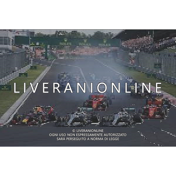 (L to R): Max Verstappen (NLD) Red Bull Racing RB15, Valtteri Bottas (FIN) Mercedes AMG F1 W10, and Lewis Hamilton (GBR) Mercedes AMG F1 W10, at the start of the race. 04.08.2019. Formula 1 World Championship, Rd 12, Hungarian Grand Prix, Budapest, Hungary, Race Day. AG ALDO LIVERANI SAS-ONLY ITALY