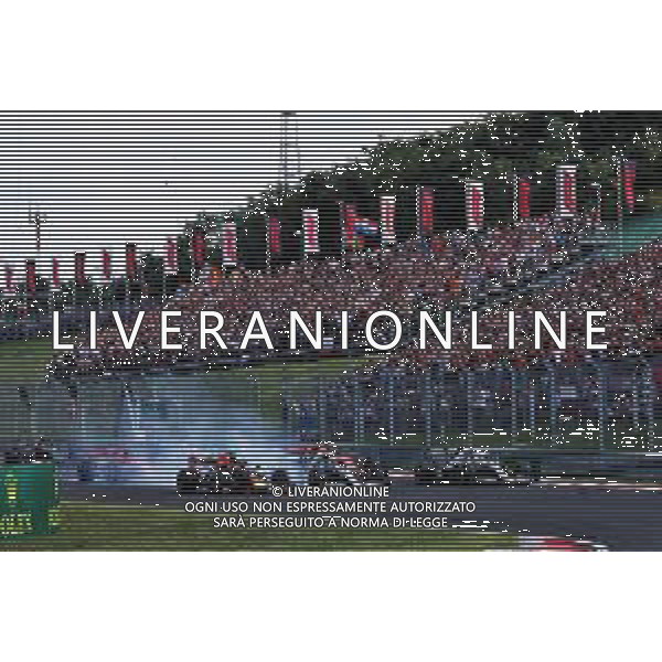 (L to R): Max Verstappen (NLD) Red Bull Racing RB15; Valtteri Bottas (FIN) Mercedes AMG F1 W10; and Lewis Hamilton (GBR) Mercedes AMG F1 W10, at the start of the race. 04.08.2019. Formula 1 World Championship, Rd 12, Hungarian Grand Prix, Budapest, Hungary, Race Day. AG ALDO LIVERANI SAS-ONLY ITALY
