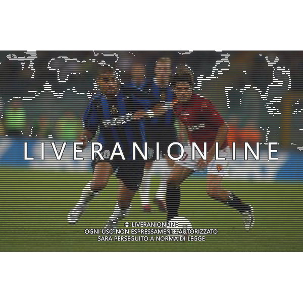 Roma 12/06/2005 Roma-Inter finale di andata Tim Cup Nella foto: Adriano Leite Ribeiro contro Perrotta Simone.* Ph Gianni Nucci/Agenzia Aldo Liverani