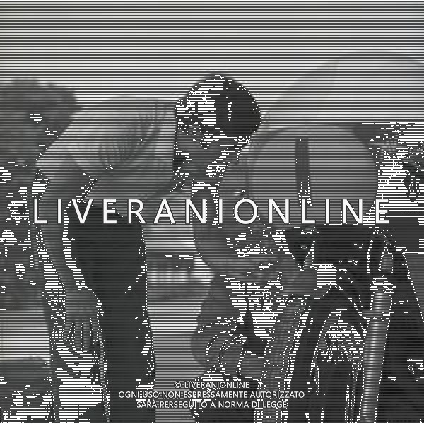 RETROSPETTIVA GIACOMO AGOSTINI PILOTA MOTOCICLISMO NELLA FOTO GIACOMO AGOSTINI NELL\'ANNO 1968 A RIMINI AL PREMIO SHELL AG ALDO LIVERANI SAS