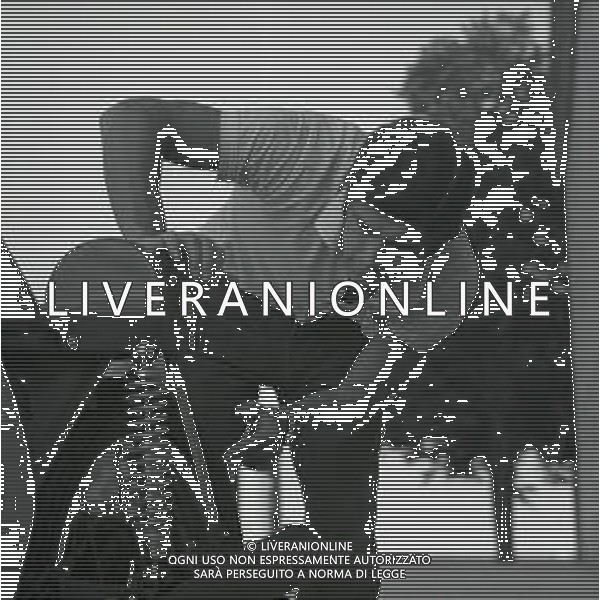 RETROSPETTIVA GIACOMO AGOSTINI PILOTA MOTOCICLISMO NELLA FOTO GIACOMO AGOSTINI NELL\'ANNO 1968 A RIMINI AL PREMIO SHELL AG ALDO LIVERANI SAS