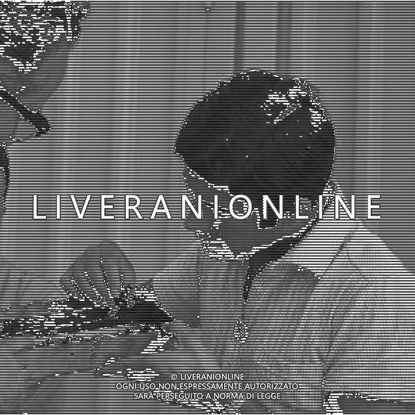 RETROSPETTIVA GIACOMO AGOSTINI PILOTA MOTOCICLISMO NELLA FOTO GIACOMO AGOSTINI NELL\'ANNO 1968 A RIMINI AL PREMIO SHELL AG ALDO LIVERANI SAS