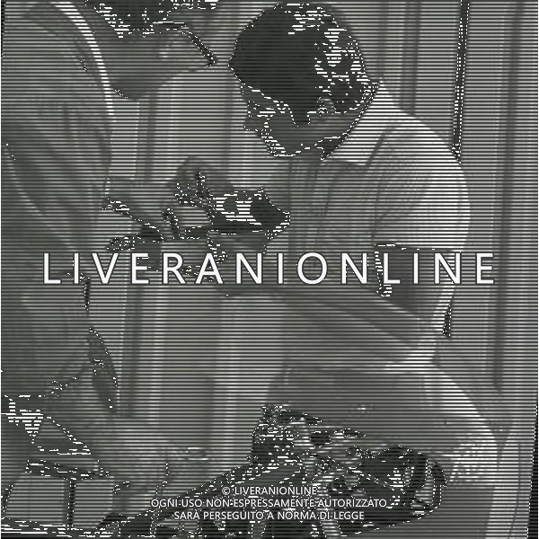 RETROSPETTIVA GIACOMO AGOSTINI PILOTA MOTOCICLISMO NELLA FOTO GIACOMO AGOSTINI NELL\'ANNO 1968 A RIMINI AL PREMIO SHELL AG ALDO LIVERANI SAS