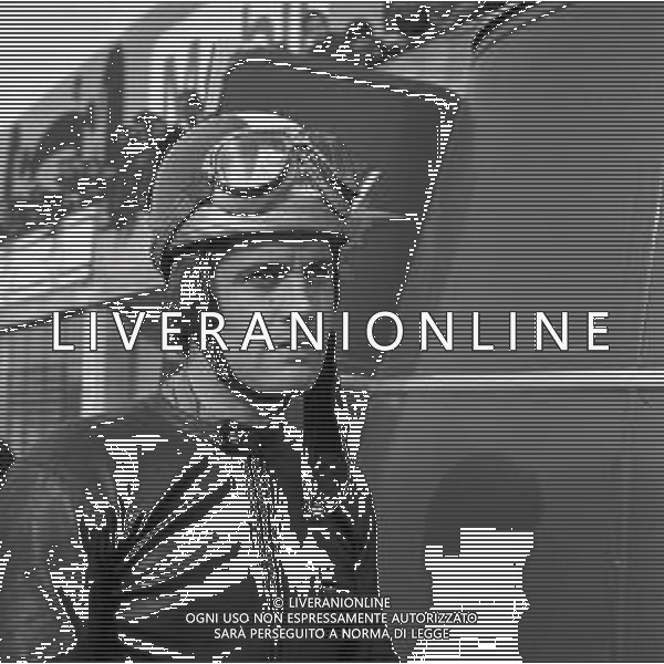 RETROSPETTIVA GIACOMO AGOSTINI PILOTA MOTOCICLISMO NELLA FOTO GIACOMO AGOSTINI NELL\'ANNO 1969 A MONZA AG ALDO LIVERANI SAS 