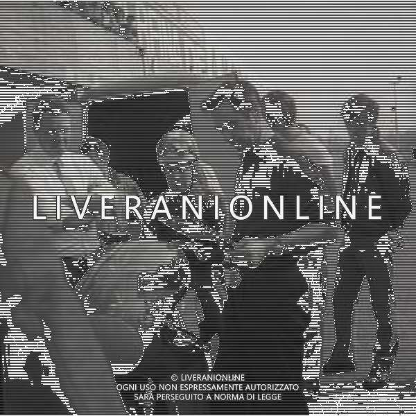 RETROSPETTIVA GIACOMO AGOSTINI PILOTA MOTOCICLISMO NELLA FOTO GIACOMO AGOSTINI NELL\'ANNO 1969 A MONZA AG ALDO LIVERANI SAS 