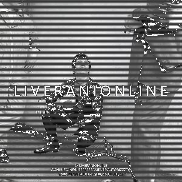 RETROSPETTIVA GIACOMO AGOSTINI PILOTA MOTOCICLISMO NELLA FOTO GIACOMO AGOSTINI NELL\'ANNO 1969 A MONZA AG ALDO LIVERANI SAS 