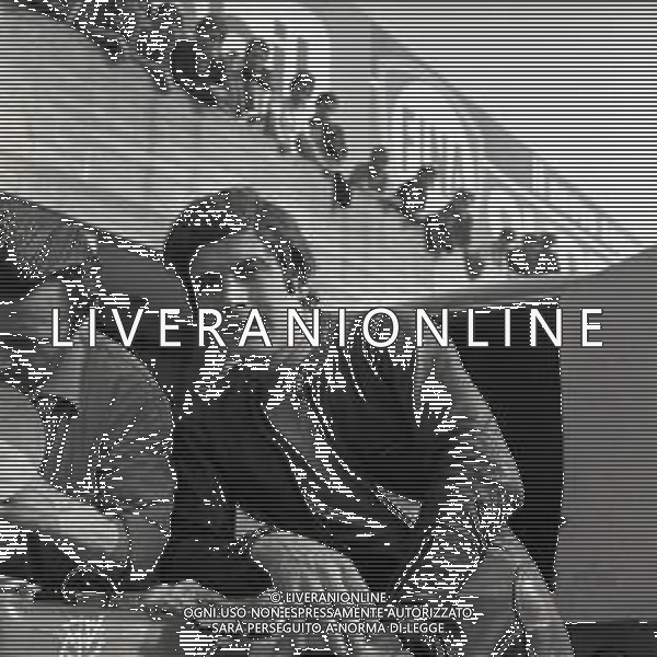 RETROSPETTIVA GIACOMO AGOSTINI PILOTA MOTOCICLISMO NELLA FOTO GIACOMO AGOSTINI NELL\'ANNO 1969 A MONZA AG ALDO LIVERANI SAS 