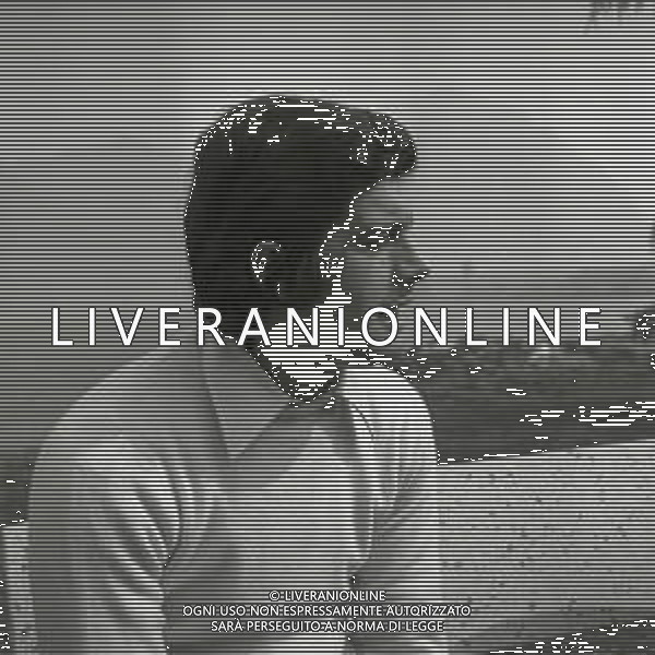 RETROSPETTIVA GIACOMO AGOSTINI PILOTA MOTOCICLISMO NELLA FOTO GIACOMO AGOSTINI NELL\'ANNO 1972 A COSTA VOLPINO NELLA SUA CASA AG ALDO LIVERANI SAS