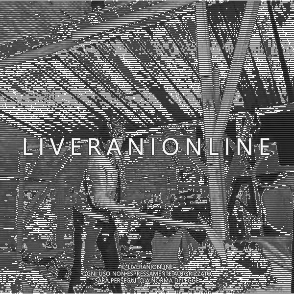 RETROSPETTIVA GIACOMO AGOSTINI PILOTA MOTOCICLISMO NELLA FOTO GIACOMO AGOSTINI NELL\'ANNO 1970 A BERGAMO NELLA COSTRUZIONE DELLA SUA NUOVA CASA AG ALDO LIVERANI SAS 