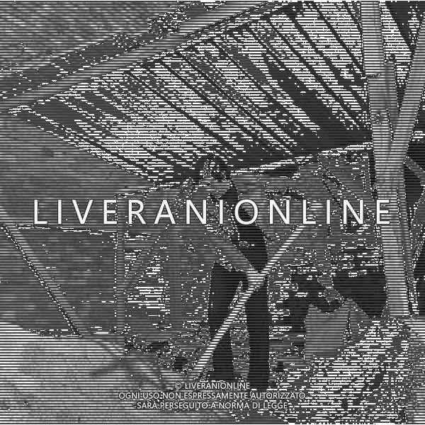 RETROSPETTIVA GIACOMO AGOSTINI PILOTA MOTOCICLISMO NELLA FOTO GIACOMO AGOSTINI NELL\'ANNO 1970 A BERGAMO NELLA COSTRUZIONE DELLA SUA NUOVA CASA AG ALDO LIVERANI SAS 