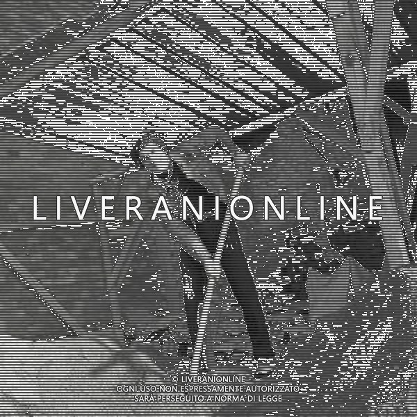 RETROSPETTIVA GIACOMO AGOSTINI PILOTA MOTOCICLISMO NELLA FOTO GIACOMO AGOSTINI NELL\'ANNO 1970 A BERGAMO NELLA COSTRUZIONE DELLA SUA NUOVA CASA AG ALDO LIVERANI SAS 