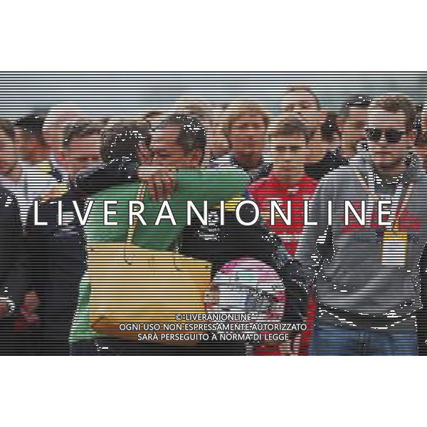 F1, F2, and F3 pay their respects to Anthoine Hubert: Mia Sharizman (MAL) Renault Sport Academy Director with his mother. 01.09.2019. Formula 1 World Championship, Rd 13, Belgian Grand Prix, Spa Francorchamps, Belgium, Race Day. - Tributo ad Anthoine Hubert, pilota automobilistico francese di Formula 2, morto dopo un incidente a Spa in Belgio il 31.08.2019 - /AGENZIA ALDO LIVERANI SAS - ITALY ONLY EDITORIAL USE ONLY