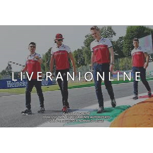 Antonio Giovinazzi (ITA) Alfa Romeo Racing walks the circuit with the team. 05.09.2019. Formula 1 World Championship, Rd 14, Italian Grand Prix, Monza, Italy, Preparation Day. AG ALDO LIVERANI SAS-ONLY ITALY