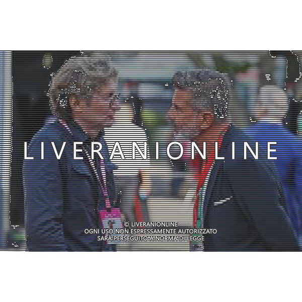 (L to R): Guido Pozzi (ITA) with Enrico Zanarini (ITA) Driver Manager. 07.09.2019. Formula 1 World Championship, Rd 14, Italian Grand Prix, Monza, Italy, Qualifying Day. AG ALDO LIVERANI SAS-ONLY ITALY