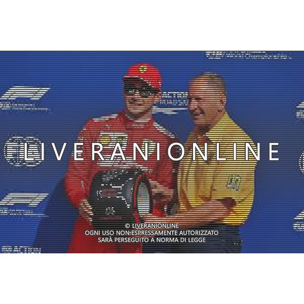 Charles Leclerc (MON) Ferrari receives the Pirelli pole position award from Jody Scheckter (RSA). 07.09.2019. Formula 1 World Championship, Rd 14, Italian Grand Prix, Monza, Italy, Qualifying Day. AG ALDO LIVERANI SAS-ONLY ITALY