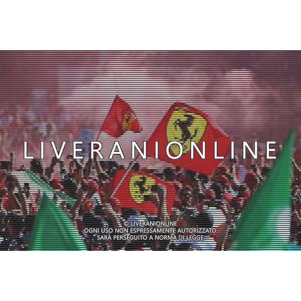 Ferrari fans celebrate at the podium. - tifosi 08.09.2019. Formula 1 World Championship, Rd 14, Italian Grand Prix, Monza, Italy, Race Day. / AGENZIA ALDO LIVERANI SAS - ITALY ONLY EDITORIAL USE ONLY - Gp F1 Italia Gara Monza 08.09.2019