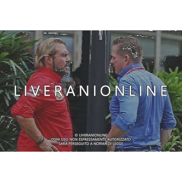 (L to R): Gino Rosato (CDN) Ferrari with Jos Verstappen (NLD). 20.09.2019. Formula 1 World Championship, Rd 15, Singapore Grand Prix, Marina Bay Street Circuit, Singapore, Practice Day. AG ALDO LIVERANI SAS-ONLY ITALY