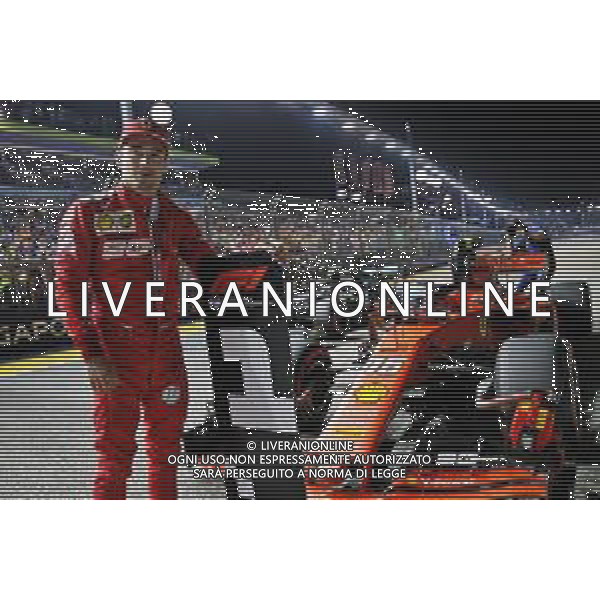 Charles Leclerc (MON) Ferrari SF90 celebrates his pole position in qualifying parc ferme. 21.09.2019. Formula 1 World Championship, Rd 15, Singapore Grand Prix, Marina Bay Street Circuit, Singapore, Qualifying Day. AG ALDO LIVERANI SAS-ONLY ITALY