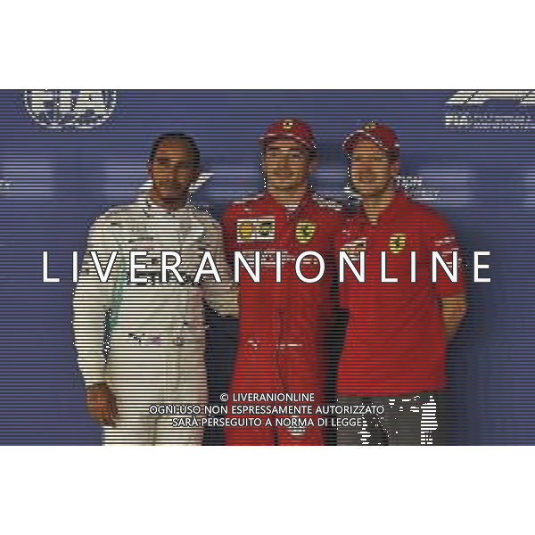 Qualifying top three in parc ferme (L to R): Lewis Hamilton (GBR) Mercedes AMG F1, second; Charles Leclerc (MON) Ferrari, pole position; Sebastian Vettel (GER) Ferrari, third. 21.09.2019. Formula 1 World Championship, Rd 15, Singapore Grand Prix, Marina Bay Street Circuit, Singapore, Qualifying Day. AG ALDO LIVERANI SAS-ONLY ITALY
