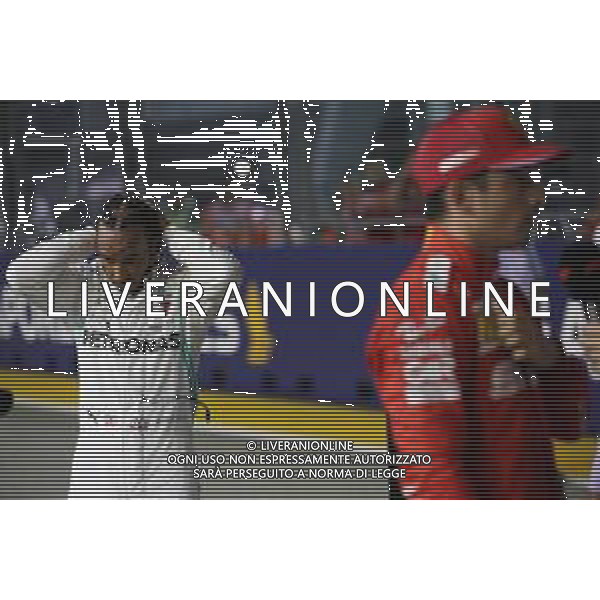 Lewis Hamilton (GBR) Mercedes AMG F1 W10 and Charles Leclerc (MON) Ferrari SF90. 21.09.2019. Formula 1 World Championship, Rd 15, Singapore Grand Prix, Marina Bay Street Circuit, Singapore, Qualifying Day. AG ALDO LIVERANI SAS-ONLY ITALY