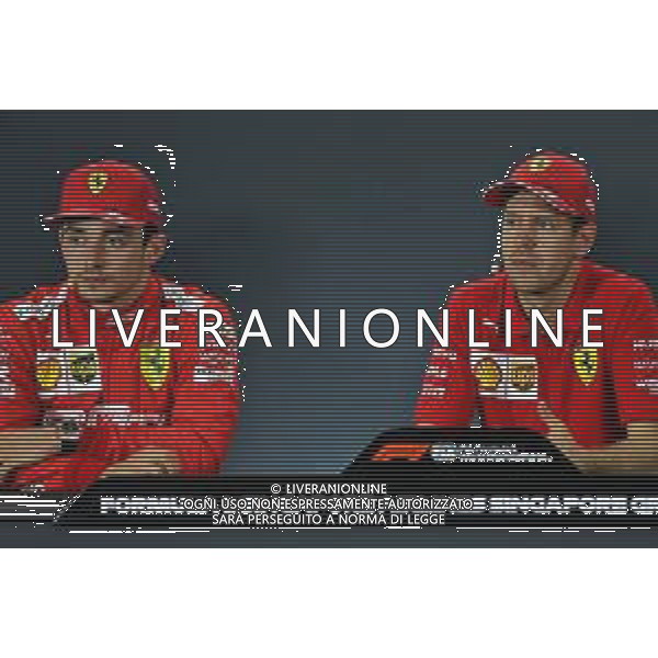 (L to R): Charles Leclerc (MON) Ferrari and Sebastian Vettel (GER) Ferrari in the post race FIA Press Conference. 22.09.2019. Formula 1 World Championship, Rd 15, Singapore Grand Prix, Marina Bay Street Circuit, Singapore, Race Day. AG ALDO LIVERANI SAS-ONLY ITALY