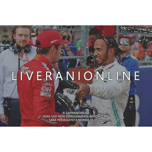 (L to R): Charles Leclerc (MON) Ferrari with Lewis Hamilton (GBR) Mercedes AMG F1 in qualifying parc ferme. 28.09.2019. Formula 1 World Championship, Rd 16, Russian Grand Prix, Sochi Autodrom, Sochi, Russia, Qualifying Day. AG ALDO LIVERANI SAS-ONLY ITALY
