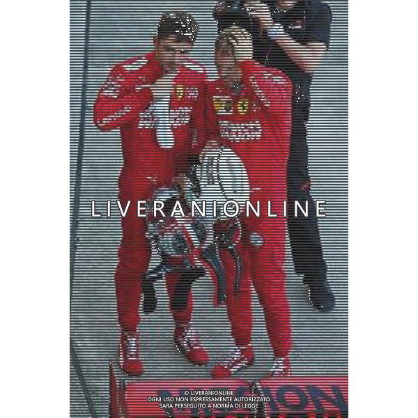 (L to R): Charles Leclerc (MON) Ferrari with team mate Sebastian Vettel (GER) Ferrari in parc ferme. 13.10.2019. Formula 1 World Championship, Rd 17, Japanese Grand Prix, Suzuka, Japan, Sunday. AG ALDO LIVERANI SAS-ONLY ITALY