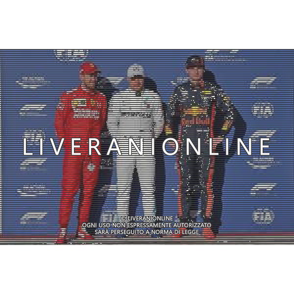 Qualifying top three in parc ferme (L to R): Sebastian Vettel (GER) Ferrari, second; Valtteri Bottas (FIN) Mercedes AMG F1, pole position; Max Verstappen (NLD) Red Bull Racing, third. 02.11.2019. Formula 1 World Championship, Rd 19, United States Grand Prix, Austin, Texas, USA, Qualifying Day. @/AGENZIA ALDO LIVERANI Sas - ITALY ONLY EDITORIAL USE ONLY - - GP F1 USA PROVE UFFICIALI QUALIFICHE AUSTIN 02.11.2019