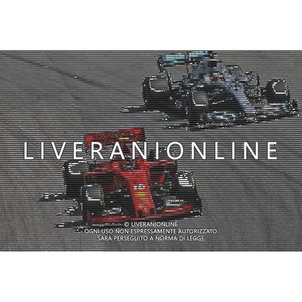 Charles Leclerc (MON) Ferrari SF90 and Lewis Hamilton (GBR) Mercedes AMG F1 W10 battle for position. 17.11.2019. Formula 1 World Championship, Rd 20, Brazilian Grand Prix, Sao Paulo, Brazil, Race Day. ©/AGENZIA ALDO LIVERANI SAS - ITALY ONLY EDITORIAL USE ONLY - - GP F1 BRASILE GARA 17.11.2019
