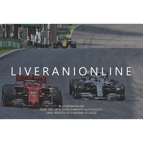 Charles Leclerc (MON) Ferrari SF90 and Valtteri Bottas (FIN) Mercedes AMG F1 W10. 17.11.2019. Formula 1 World Championship, Rd 20, Brazilian Grand Prix, Sao Paulo, Brazil, Race Day. ©/AGENZIA ALDO LIVERANI SAS - ITALY ONLY EDITORIAL USE ONLY - - GP F1 BRASILE GARA 17.11.2019