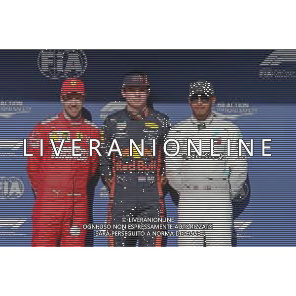 Qualifying top three in parc ferme (L to R): Sebastian Vettel (GER) Ferrari, second; Max Verstappen (NLD) Red Bull Racing, pole position; Lewis Hamilton (GBR) Mercedes AMG F1, third. 16.11.2019. Formula 1 World Championship, Rd 20, Brazilian Grand Prix, Sao Paulo, Brazil, Qualifying Day. ONLY ITALY-AG ALDO LIVERANI SAS