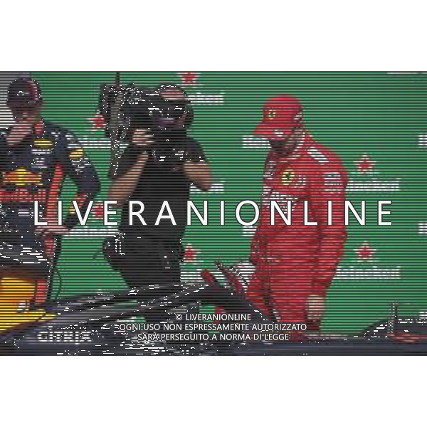 Sebastian Vettel (GER) Ferrari SF90 looking at the Redbull car. 16.11.2019. Formula 1 World Championship, Rd 20, Brazilian Grand Prix, Sao Paulo, Brazil, Qualifying Day. ONLY ITALY-AG ALDO LIVERANI SAS