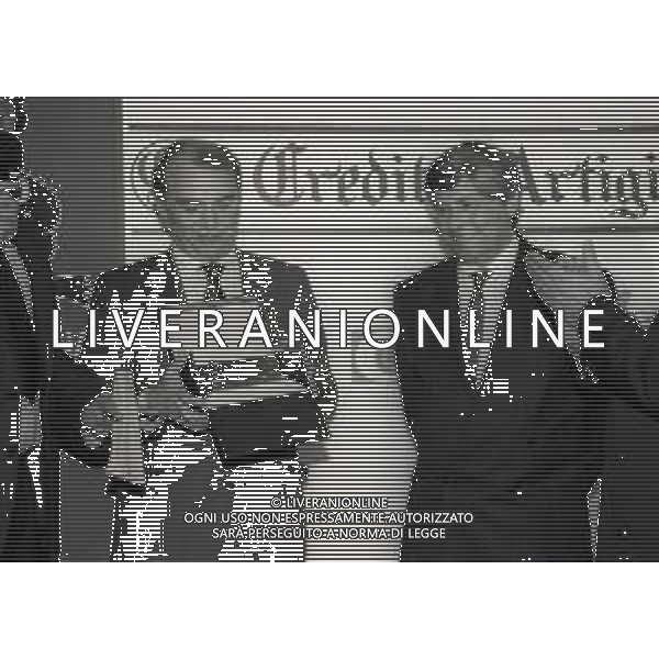 RETROSPETTIVA ERNESTO PELLEGRINI PRESIDENTE FC INTER NELLA FOTO ERNESTO PELLEGRINI NELL\'ANNO 1990 AL PREMIO TORRETTA CON LUCIANO NIZZOLA  AG ALDO LIVERANI SAS 