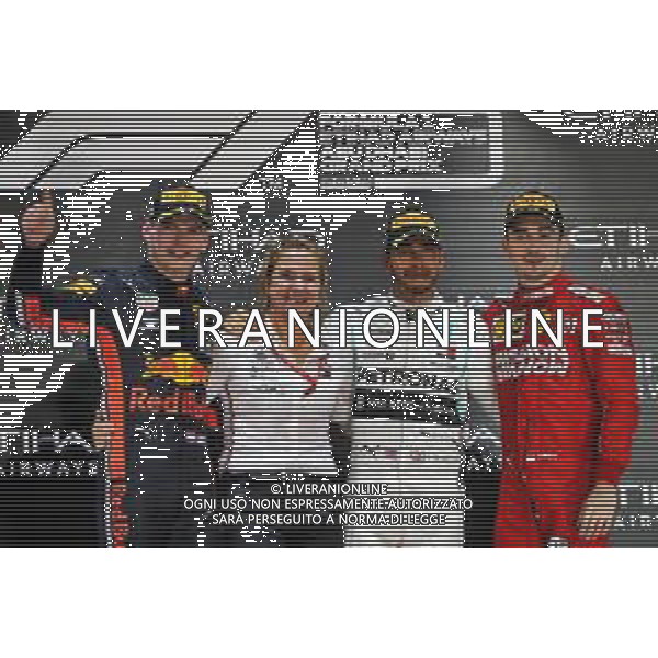 The podium (L to R): Max Verstappen (NLD) Red Bull Racing, second; Britta Seeger, Member of the Board of Management for Mercedes-Benz Cars Marketing and Sales; Lewis Hamilton (GBR) Mercedes AMG F1, race winner; Charles Leclerc (MON) Ferrari, third. 01.12.2019. Formula 1 World Championship, Rd 21, Abu Dhabi Grand Prix, Yas Marina Circuit, Abu Dhabi, Race Day. AG ALDO LIVERANI SAS-ONLY ITALY