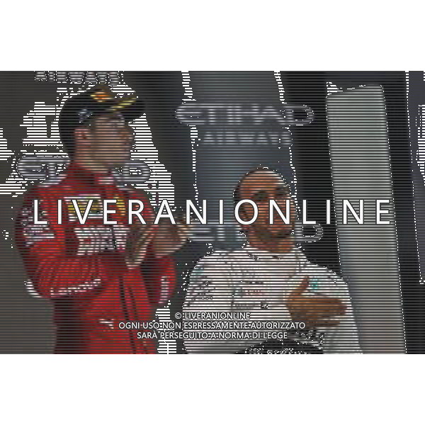 Race winner Lewis Hamilton (GBR) Mercedes AMG F1 celebrates on the podium. 01.12.2019. Formula 1 World Championship, Rd 21, Abu Dhabi Grand Prix, Yas Marina Circuit, Abu Dhabi, Race Day. AG ALDO LIVERANI SAS-ONLY ITALY