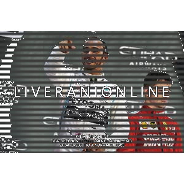 Race winner Lewis Hamilton (GBR) Mercedes AMG F1 celebrates on the podium. 01.12.2019. Formula 1 World Championship, Rd 21, Abu Dhabi Grand Prix, Yas Marina Circuit, Abu Dhabi, Race Day. AG ALDO LIVERANI SAS-ONLY ITALY