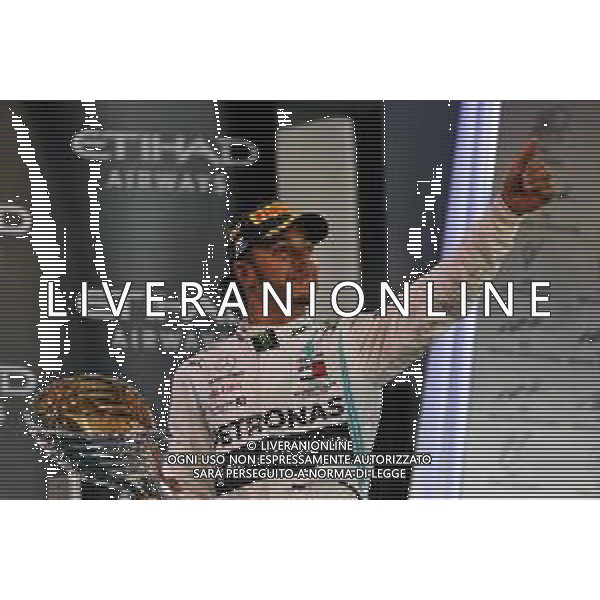 Race winner Lewis Hamilton (GBR) Mercedes AMG F1 celebrates on the podium. 01.12.2019. Formula 1 World Championship, Rd 21, Abu Dhabi Grand Prix, Yas Marina Circuit, Abu Dhabi, Race Day. AG ALDO LIVERANI SAS-ONLY ITALY