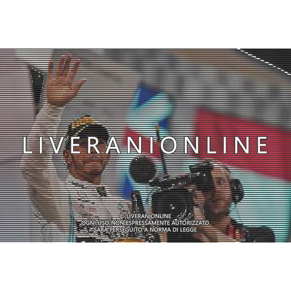 Race winner Lewis Hamilton (GBR) Mercedes AMG F1 celebrates on the podium. 01.12.2019. Formula 1 World Championship, Rd 21, Abu Dhabi Grand Prix, Yas Marina Circuit, Abu Dhabi, Race Day. AG ALDO LIVERANI SAS-ONLY ITALY