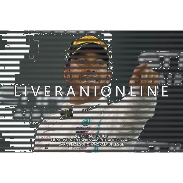 Race winner Lewis Hamilton (GBR) Mercedes AMG F1 celebrates on the podium. 01.12.2019. Formula 1 World Championship, Rd 21, Abu Dhabi Grand Prix, Yas Marina Circuit, Abu Dhabi, Race Day. AG ALDO LIVERANI SAS-ONLY ITALY