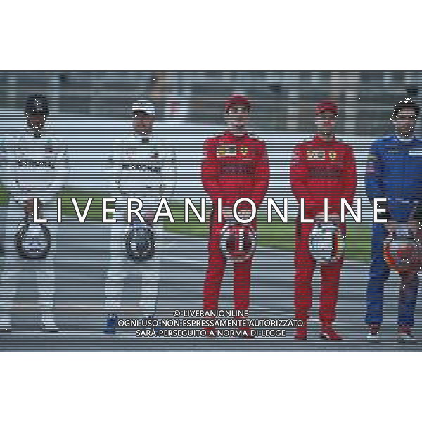 (L to R): Lewis Hamilton (GBR) Mercedes AMG F1; Valtteri Bottas (FIN) Mercedes AMG F1; Charles Leclerc (MON) Ferrari; Sebastian Vettel (GER) Ferrari, at a drivers group photograph. 19.02.2020. Formula One Testing, Day One, Barcelona, Spain. Wednesday. - / AGENZIA ALDO LIVERANI SAS - ITALY ONLY EDITORIAL USE ONLY - Test F1 Barcellona Spagna 19.02.2020