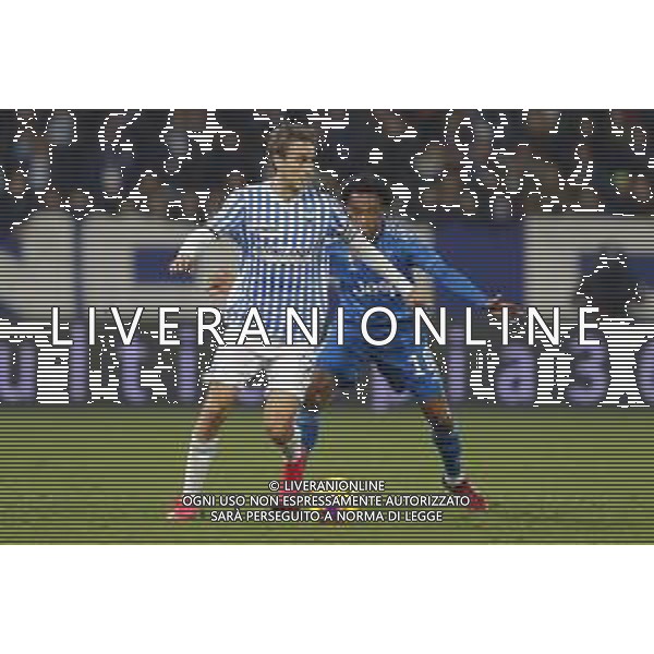 Spal - Juventus Campionato di Calcio Serie A TIM 22/02/2020 nella foto: Missiroli Simone (spal ferrara) Cuadrado Juan (Juventus f.c.) ©Claudio Zamagni/Agenzia Aldo Liverani ---- Missiroli Simone (spal ferrara) Cuadrado Juan (Juventus f.c.) during Italian Serie A soccer match between S.P.A.L. Ferrara and JUVENTUS F.C. at Ferrara Paolo Mazza Stadium on February 22 2020 photo credit by Claudio Zamagni/Aldo Liverani Photo Agency / AGENZIA ALDO LIVERANI SAS