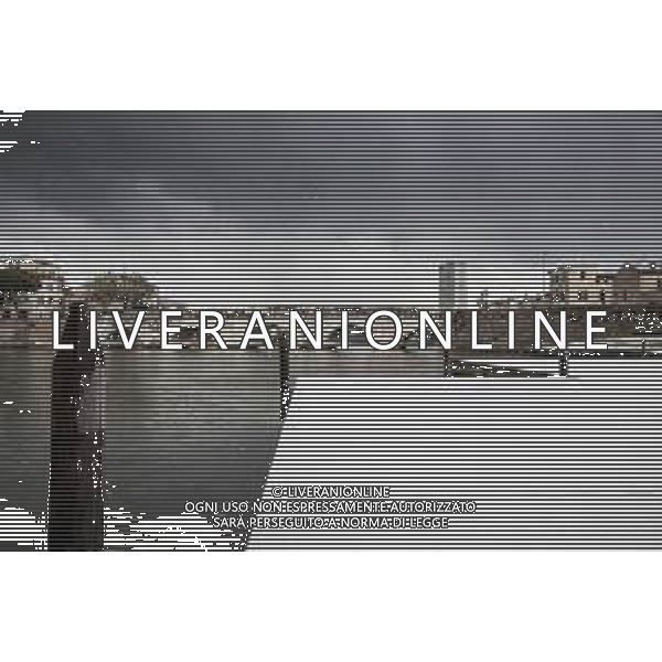 Rimini 25/03/2020 - Breve ma intensa nevicata durante l\' emergenza Coronavirus a Rimini - nella foto: il ponte di Tiberio e il parco marecchia imbiancati dalla neve ©Claudio Zamagni/Agenzia Aldo Liverani / AGENZIA ALDO LIVERANI SAS