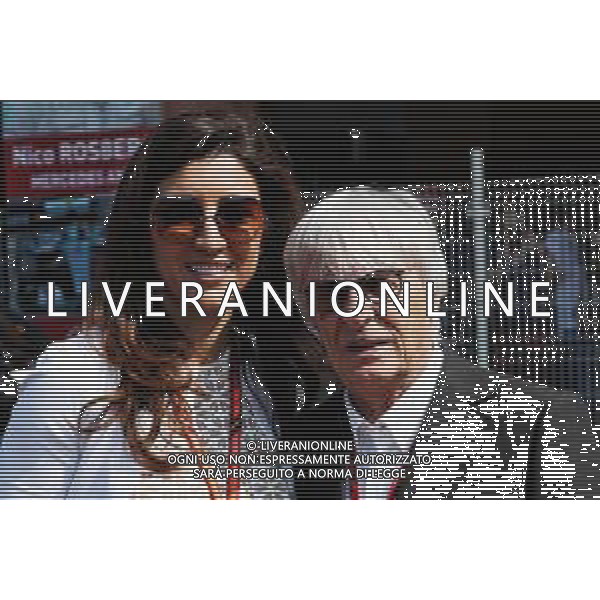 Bernie Ecclestone (GBR) with his wife Fabiana Flosi (BRA). 26.05.2017. Formula 1 World Championship, Rd 6, Monaco Grand Prix, Monte Carlo, Monaco, Friday. / AGENZIA ALDO LIVERANI SAS - ITALY ONLY EDITORIAL USE ONLY - Bernie Ecclestone (GBR) con la moglie Fabiana Flosi (BRA).
