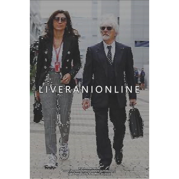 Bernie Ecclestone (GBR) with his wife Fabiana Flosi (BRA). 30.09.2018. Formula 1 World Championship, Rd 16, Russian Grand Prix, Sochi Autodrom, Sochi, Russia, Race Day. / AGENZIA ALDO LIVERANI SAS - ITALY ONLY EDITORIAL USE ONLY - Bernie Ecclestone (GBR) con la moglie Fabiana Flosi (BRA).