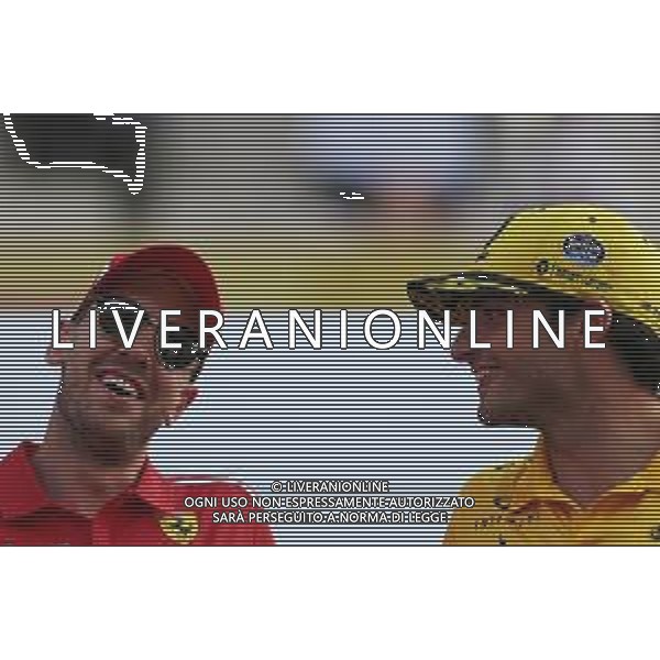 Sebastian Vettel (GER) Scuderia Ferrari and Carlos Sainz Jr (ESP) Renault F1 Team 25.11.2018. Formula 1 World Championship, Rd 21, Abu Dhabi Grand Prix, Yas Marina Circuit, Abu Dhabi, Race Day. / AGENZIA ALDO LIVERANI SAS - ITALY ONLY EDITORIAL USE ONLY