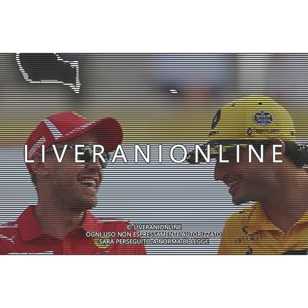 Sebastian Vettel (GER) Scuderia Ferrari and Carlos Sainz Jr (ESP) Renault F1 Team 25.11.2018. Formula 1 World Championship, Rd 21, Abu Dhabi Grand Prix, Yas Marina Circuit, Abu Dhabi, Race Day. / AGENZIA ALDO LIVERANI SAS - ITALY ONLY EDITORIAL USE ONLY