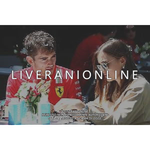 (L to R): Charles Leclerc (MON) Ferrari with his girlfriend Charlotte Sine (MON). 12.03.2020. Formula 1 World Championship, Rd 1, Australian Grand Prix, Albert Park, Melbourne, Australia, Preparation Day. / AGENZIA ALDO LIVERANI SAS - ITALY ONLY EDITORIAL USE ONLY - Charles Leclerc Ferrari F1 with his girlfriend Charlotte Sine\'