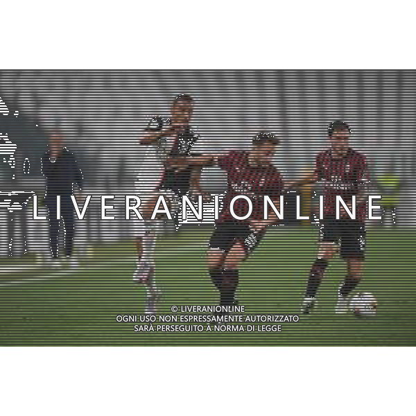 Juventus - Milan Semifinale ritorno Coppa Italia Tim Cup Juventus Stadium Torino 12.06.2020 -partita giocata a porte chiuse emergenza coronavirus Nella foto danilo e hakan calhanoglu e davide calabria ©Agenzia Aldo Liverani Sas
